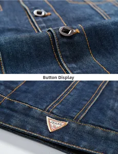 Detailed view of dark blue denim jacket with vintage metal buttons and woven logo tag