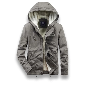 Detailed view of men's winter hooded jacket with thick canvas and warm sherpa lining