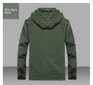 Rear view of thin dark green hooded windbreaker jacket with elastic cuffs and drawstrings