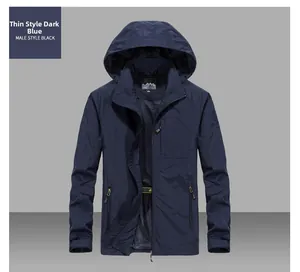 Detail view of dark blue lightweight hooded jacket with mesh lining and zip pockets