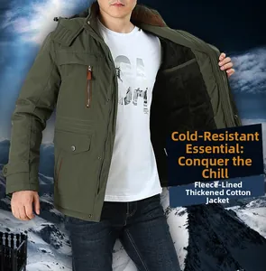 Detail of army green winter parka showing warm fleece lining and hood in the snow