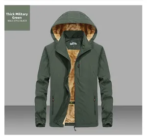 Detail of military green windproof hooded jacket with thick khaki fleece lining and zippers