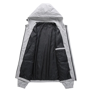 Light gray hooded windbreaker for men featuring black lining and full-zip design