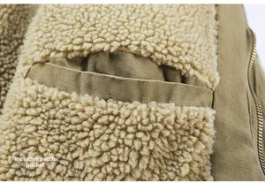 Detail of khaki canvas jacket showing internal pocket and warm lamb wool lining texture