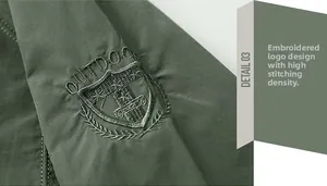 Close-up of military green outdoor jacket with high-density embroidered outdoor shield logo