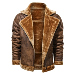 Detail of men's brown shearling jacket featuring warm fleece lining and wide lapels