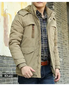 Close-up of khaki winter parka with thick faux fur lining and multiple utility pockets