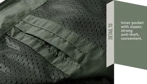 Detail of tactical jacket interior featuring breathable black mesh lining and hidden security pocket