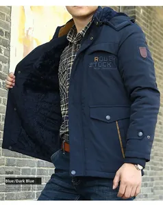 Detail of warm black fleece lining and embroidered chest logo on men's navy winter jacket