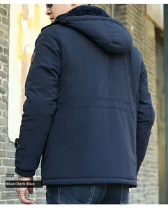 Detail of winter parka featuring thick fleece lining and warm hooded collar in deep blue