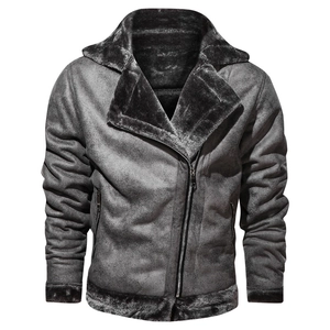 Close-up detail of thick sheepskin fleece lining and faux suede fabric on biker jacket