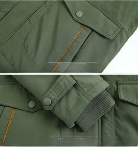 Detail of army green winter jacket showing large square pockets and ribbed elastic cuffs