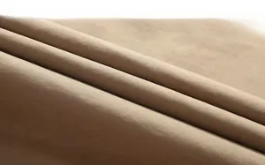 Detailed view of khaki twill fabric texture showing soft drape on outdoor tactical jacket