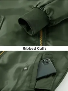Detail of ribbed cuffs, metal zipper and pocket capacity on army green bomber jacket