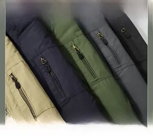 Detail of outdoor jacket arm pocket with anti-slip zipper pulls in five colors