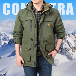 Detail view of military green hiking jacket showing warm fleece lining and pockets