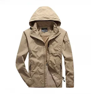 Detail of khaki outdoor tactical jacket with adjustable hood and mesh lining