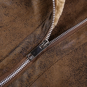 Vintage brown faux suede jacket with warm lamb wool lining and silver metal zipper