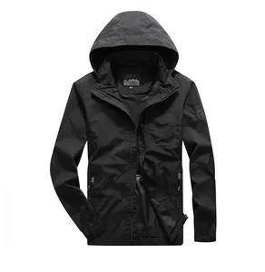 Detail of waterproof outdoor tactical jacket showing the sleeve badge and adjustable cuff