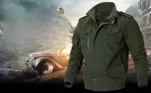 Detail of army green military jacket with shoulder epaulets and chest pockets in field setting