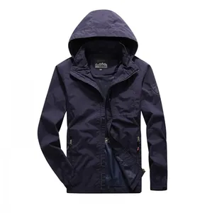 Detail of outdoor windbreaker jacket with adjustable velcro cuffs and utility patch