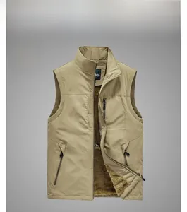 Detail of khaki outdoor vest showing warm brown fleece lining and durable windproof fabric