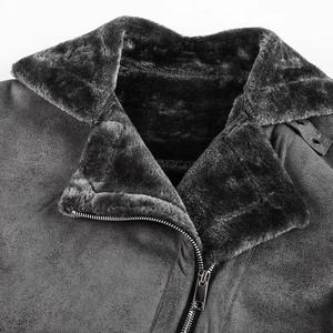 Detail view of winter suede biker jacket with black faux fur collar and metal zipper