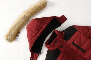 Men's heavy winter parka in deep red with thick fleece lining and detachable faux fur hood