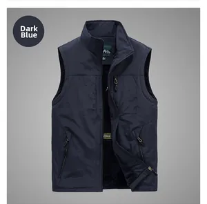 Detail of dark blue windproof vest showing warm black fleece lining and durable nylon fabric