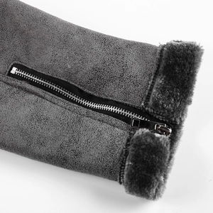 Detailed macro view of grey faux suede jacket cuffs with thick plush lining and metal zipper