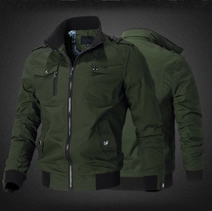Detail of army green military jacket featuring stand collar, epaulets, and ribbed cuffs