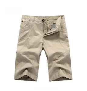 Detailed front view of khaki cotton cargo shorts featuring reinforced stitching and pockets