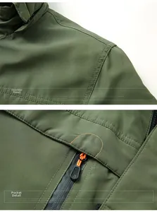 Detail view of military green jacket showing shoulder stitching and waterproof zipper pocket