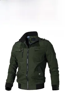 Detail of army green military jacket with ribbed collar, cuffs and shoulder epaulettes