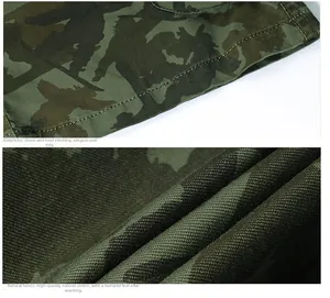 Detailed view showing premium stitching and cotton camouflage fabric texture on cargo shorts