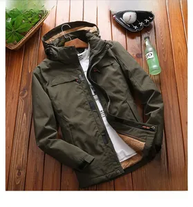 Detailed flat lay of men's olive green hooded jacket with warm fleece lining and pockets