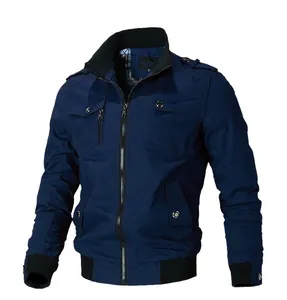 Close-up of deep blue cargo jacket with shoulder straps and functional zip pockets