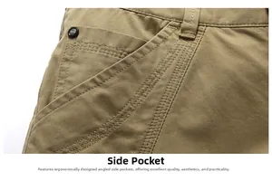 Detail shot of khaki cotton cargo shorts side pocket with reinforced stitching