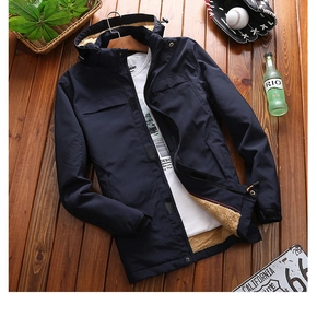 Detailed close-up of navy blue winter jacket featuring warm fleece lining and hood cords