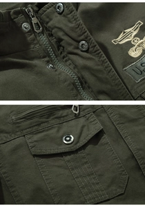 Detailed macro view of heavy canvas fabric with U.S. eagle embroidery and metal zipper