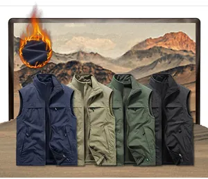 Detail view of reversible stand collar fleece vests in navy, khaki, green, and black