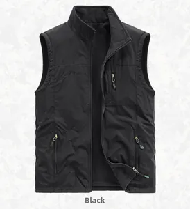 Detail of black fleece vest showing stand collar, zipper pockets and warm lining