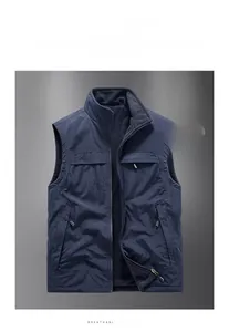 Detail of blue reversible fleece vest with thermal lining and stand collar for men