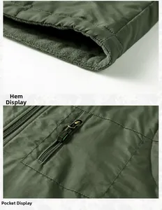 Detail of army green fleece vest showing hem finishing and functional zipper pocket
