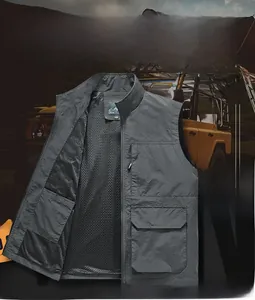 Detail view of multi-pocket utility vest showing stand collar and mesh lining