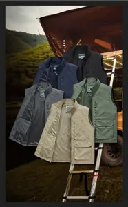 Detail view of multi-pocket utility vests in five colors with breathable mesh lining