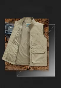 Detail of khaki outdoor vest showing functional multi-pockets and breathable mesh lining