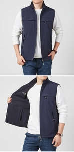 Detail of outdoor vest with fleece lining, multi-pockets and stand-up collar
