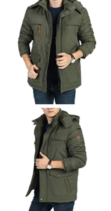 Detail of olive green winter parka with ROUGH STOCK embroidery and multi-pocket design