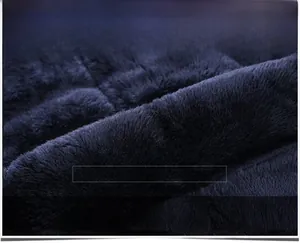 Detailed close-up of thick navy blue fleece lining for ultimate winter warmth and comfort